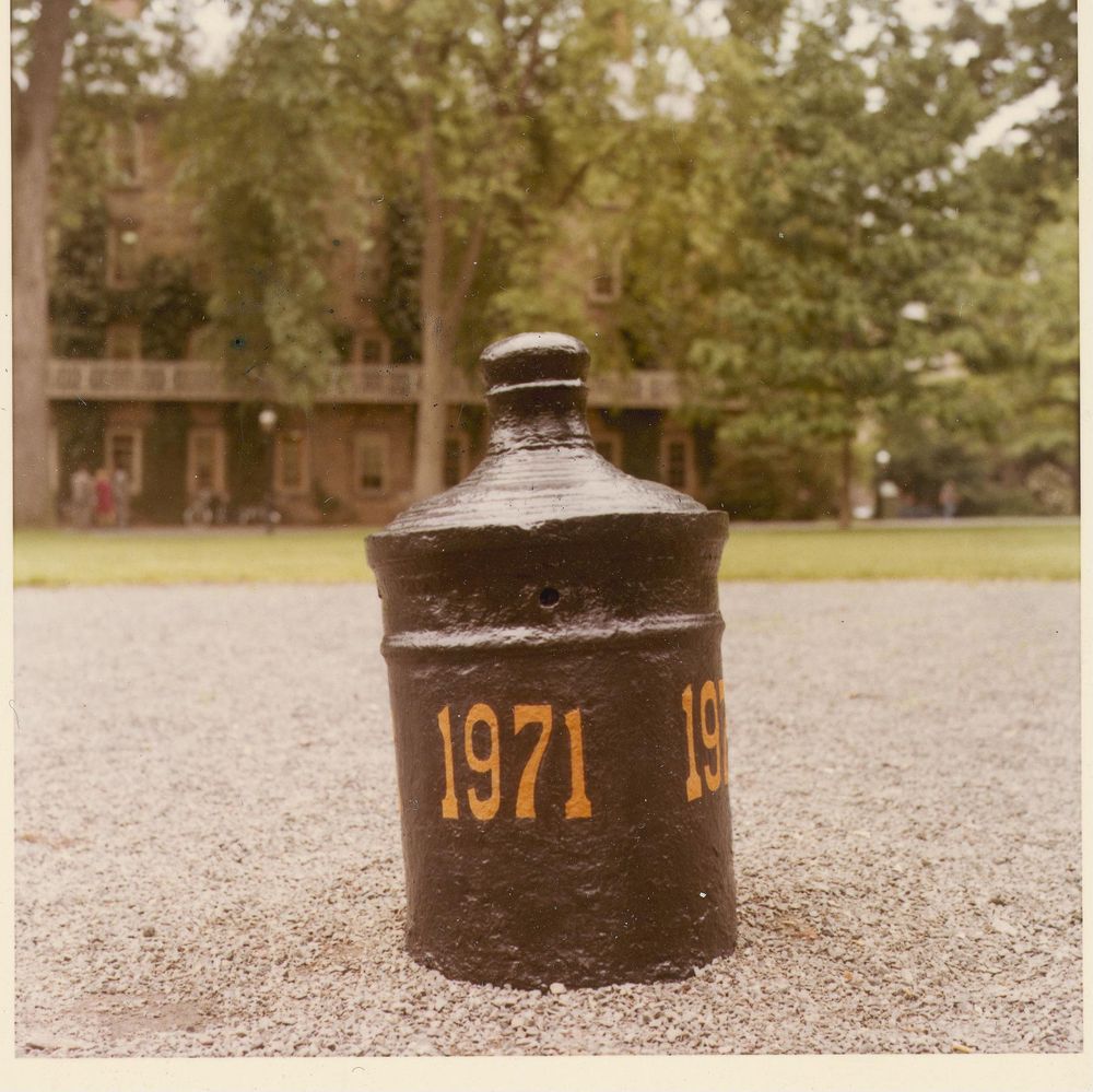 color photo of old cannon with the class of 1971 lettering in orange