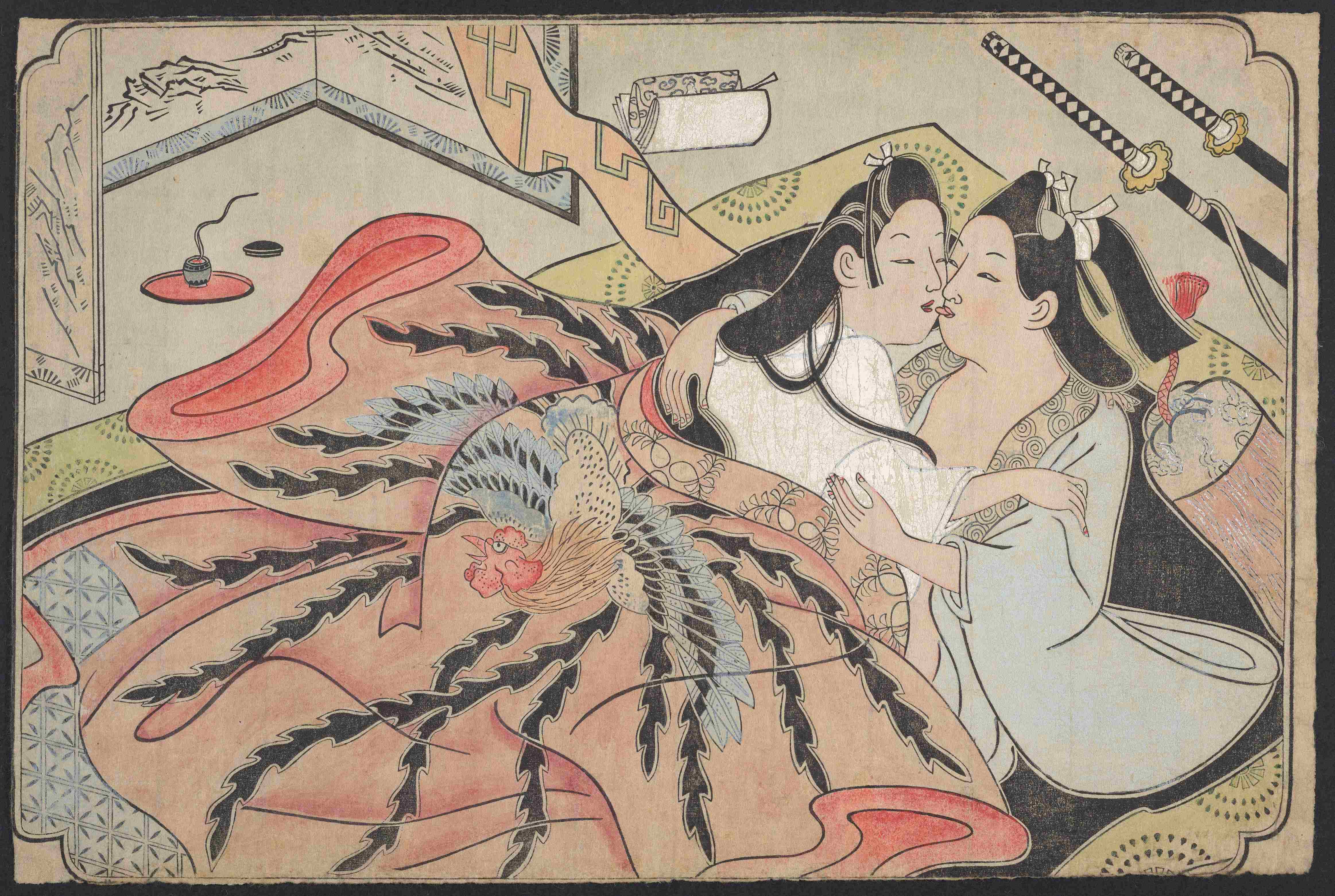Hand-colord print of a Yoshiwara courtesan and a young samurai (identified by the two swords) making love under a robe elaborately decorated with a phoenix design.